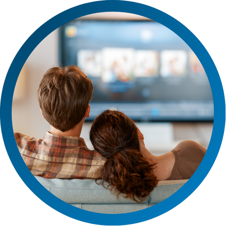 Young couple streaming entertainment using Vibrant internet.