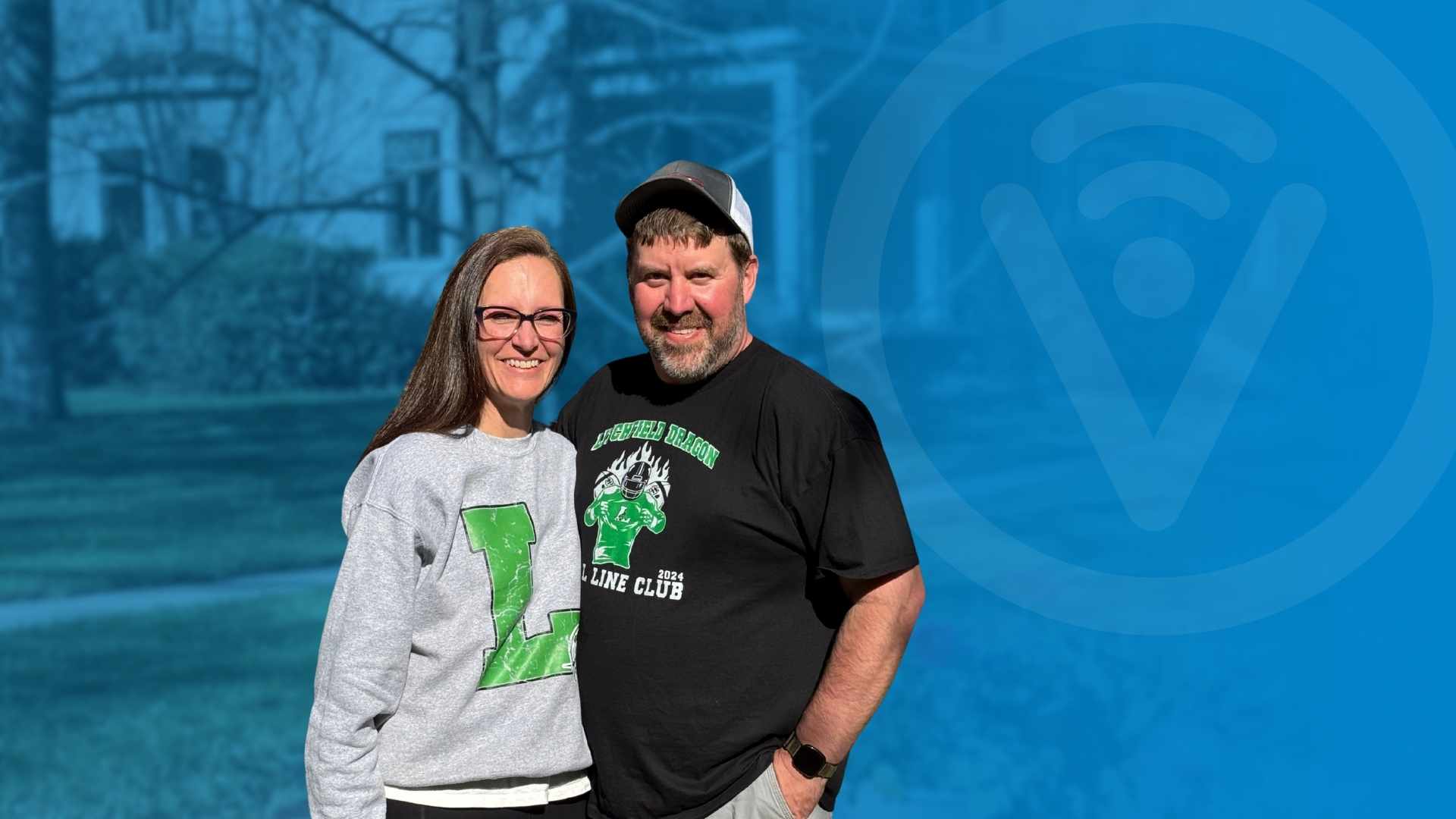 Litchfield couple standing in yard and smiling.
