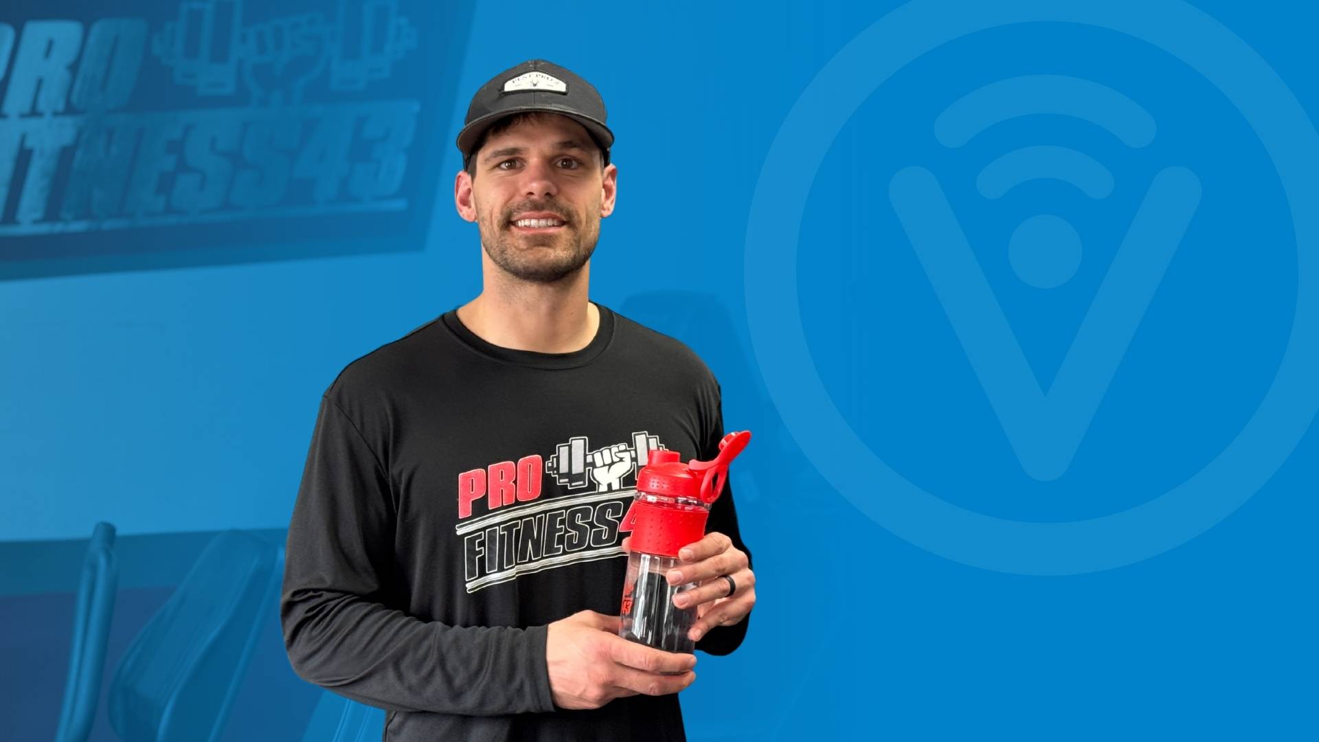 Fitness person holding water bottle.