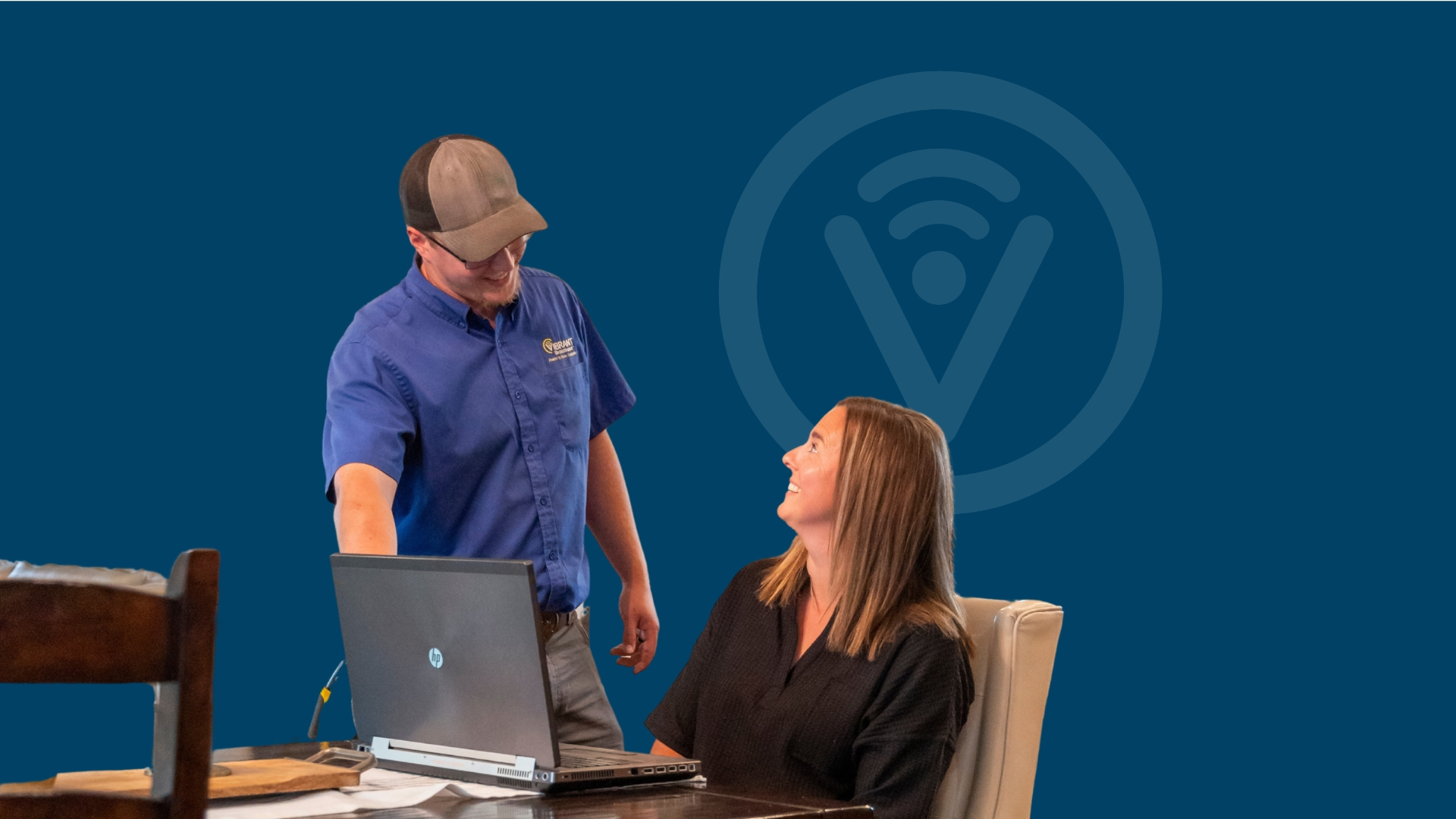 Person helping computer user
